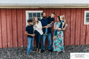 Littleton family photographer 17 Mile House Denver Colorado photography candid real moments captured farm old barn big kids