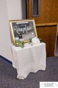 Littleton wedding photographer Arvada Baptist church photography bride and groom dress bridesmaids groomsmen flower girls reception