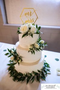 Littleton wedding photographer Arvada Baptist church photography bride and groom dress bridesmaids groomsmen flower girls reception