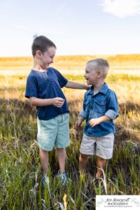 Littleton family and newborn baby photographer in home lifestyle photo session photography girl boys little sister brothers outdoor outside summer