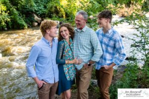 Littleton high school senior photographer and family photography portrait photo session Morrison Dakota Ridge basketball boy sunset red rocks brothers mother father sons river urban nature bridge