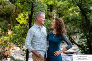 Littleton high school senior photographer and family photography portrait photo session Morrison Dakota Ridge basketball boy sunset red rocks brothers mother father sons river urban nature bridge