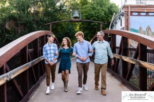 Littleton high school senior photographer and family photography portrait photo session Morrison Dakota Ridge basketball boy sunset red rocks brothers mother father sons river urban nature bridge