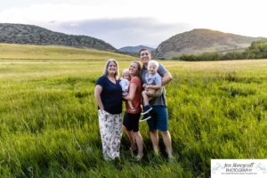 Littleton family photographer Hildebrand Ranch sunset foothills photography barn kids siblings mother father sister brother grandmother daughter son summer cute