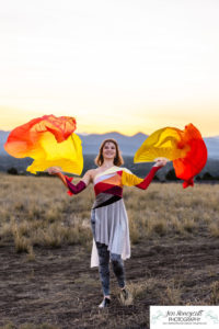 Littleton high school senior photographer color guard Heritage Class of 2023 girl teen water photography sunset mountain foothills views