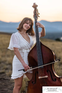 Littleton high school senior photographer color guard Heritage Class of 2023 girl teen water photography sunset mountain foothills views