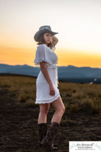 Littleton high school senior photographer color guard Heritage Class of 2023 girl teen water photography sunset mountain foothills views