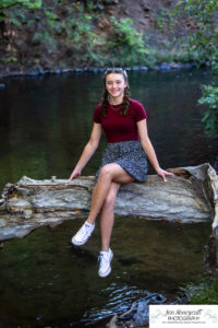 Littleton high school senior teen photographer girl fall class of 2023 Dakota Ridge volleyball player photography Lair O' the bear park sunset
