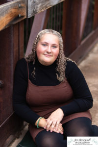 Littleton high school photographer teen Downtown Morrison photography bird parrot bridge urban class of 2023