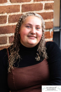 Littleton high school photographer teen Downtown Morrison photography bird parrot bridge urban class of 2023