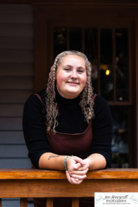 Littleton high school photographer teen Downtown Morrison photography bird parrot bridge urban class of 2023