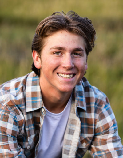 Littleton high school senior photographer South Valley Open Space park Highlands Ranch Thunder Ridge teen boy photography portrait photo session baseball player sunset