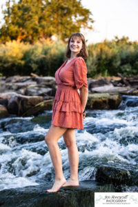 Littleton high school senior photographer color guard Heritage Class of 2023 girl teen water photography sunset mountain foothills views