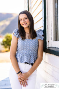 Littleton high school senior photographer class of 2023 SkyView Academy Highlands Ranch Golden Colorado teen girl cap and gown graduate river creek photography