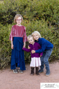 Littleton family photographer South Valley red rocks kids siblings mother father son daughter sunset photography Colorado foothills