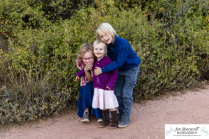 Littleton family photographer South Valley red rocks kids siblings mother father son daughter sunset photography Colorado foothills