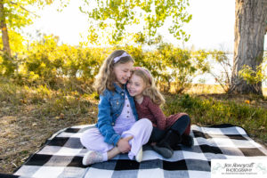 Littleton family photographer Harriman Lake Lakewood fall photography sunset sibling sisters cute kids beach water Colorado