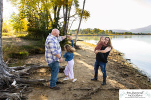 Littleton family photographer Harriman Lake Lakewood fall photography sunset sibling sisters cute kids beach water Colorado