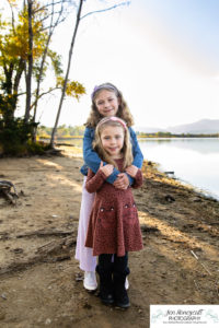 Littleton family photographer Harriman Lake Lakewood fall photography sunset sibling sisters cute kids beach water Colorado