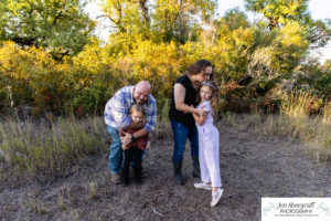 Littleton family photographer Harriman Lake Lakewood fall photography sunset sibling sisters cute kids beach water Colorado