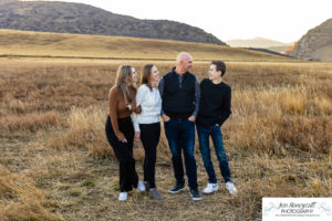 Littleton family photographer Hildebrand Ranch fall teens teenagers kids sunset Colorado photography barn