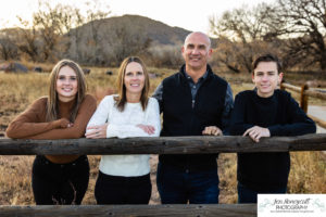 Littleton family photographer Hildebrand Ranch fall teens teenagers kids sunset Colorado photography barn siblings