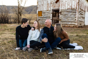 Littleton family photographer Hildebrand Ranch fall teens teenagers kids sunset Colorado photography barn siblings