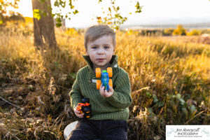 Littleton family photographer fall colors leaves Fly'N B park extended cousins grandparents siblings photography crying baby sunset Highline Trail boy girls