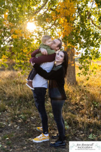 Littleton family photographer fall colors leaves Fly'N B park extended cousins grandparents siblings photography crying baby sunset Highline Trail boy girls