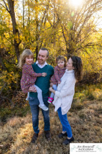 Littleton family photographer sisters girls Writer's Vista park photography wooden bridge fall leaves Highline Trail