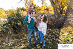 Littleton family photographer sisters girls Writer's Vista park photography wooden bridge fall leaves Highline Trail