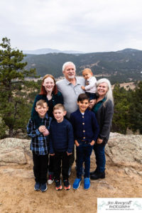 Littleton family photographer extended grandparents kids cousins cold snow Mt. Falcon sunset photography Colorado mountain views fall baby boys girls siblings