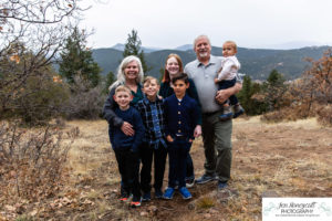 Littleton family photographer extended grandparents kids cousins cold snow Mt. Falcon sunset photography Colorado mountain views fall baby boys girls siblings