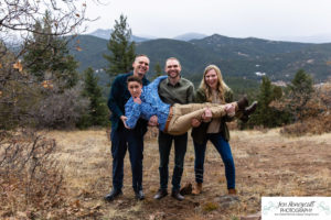 Littleton family photographer extended grandparents kids cousins cold snow Mt. Falcon sunset photography Colorado mountain views fall baby boys girls siblings