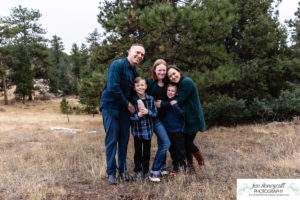 Littleton family photographer extended grandparents kids cousins cold snow Mt. Falcon sunset photography Colorado mountain views fall baby boys girls siblings