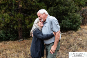 Littleton family photographer extended grandparents kids cousins cold snow Mt. Falcon sunset photography Colorado mountain views fall baby boys girls siblings