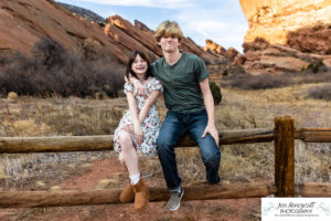 Littleton family photographer Red Rocks Amphitheatre kids teens brothers sister friends grandmother extended sunset photography fall Thanksgiving trip view Arizona foothills Colorado