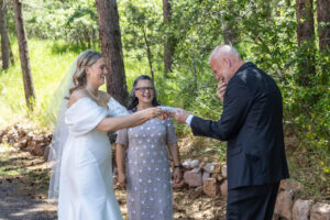 Littleton wedding photographer Colorado bride and groom photography bubble exit marriage married husband wife Pinecrest venue Palmer Lake father first look parents