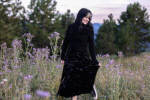 Littleton high school senior photographer teen girl Arvada West class of 2024 Mt. Falcon park Colorado wildflowers mountain view foothills photography sunset