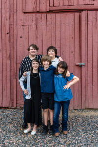 Littleton family photographer Colorado photography 17 Mile House cousins grandparents barn sunset