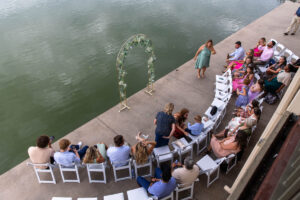 Littleton wedding photographer bride and groom Wash Park boathouse Denver summer Colorado photography white dress water lake sunset reception ceremony