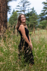 Littleton high school senior photographer Colorado graduate photography portrait session mountains Mt. Falcon foothills Heritage class of 2024 flute player band wildflowers