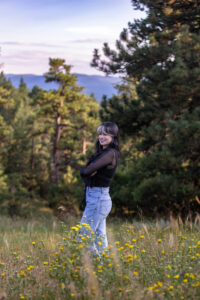 Littleton high school senior photographer teen girl Arvada West class of 2024 Mt. Falcon park Colorado wildflowers mountain view foothills photography sunset