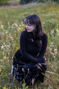 Littleton high school senior photographer teen girl Arvada West class of 2024 Mt. Falcon park Colorado wildflowers mountain view foothills photography sunset