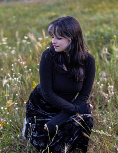 Littleton high school senior photographer teen girl Arvada West class of 2024 Mt. Falcon park Colorado wildflowers mountain view foothills photography sunset