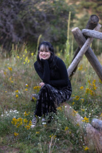Littleton high school senior photographer teen girl Arvada West class of 2024 Mt. Falcon park Colorado wildflowers mountain view foothills photography sunset
