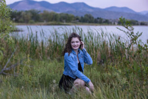 Littleton high school senior photographer Harriman Lake Lakewood Colorado class of 2024 homeschooled lake mountains foothills friend teen girl sunset photography