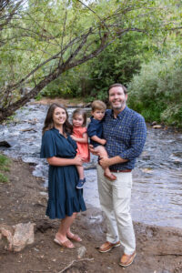 Littleton family photographer Lair O' the Bear park summer twins Colorado photography river water bridge two years old