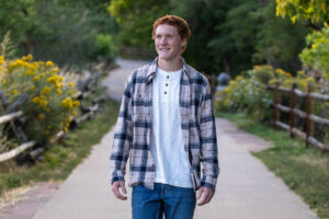 Littleton high school senior photographer Golden Colorado Clear Creek river park photography sunset foothills ginger basketball boy teenager