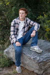 Littleton high school senior photographer Golden Colorado Clear Creek river park photography sunset foothills ginger basketball boy teenager rocks